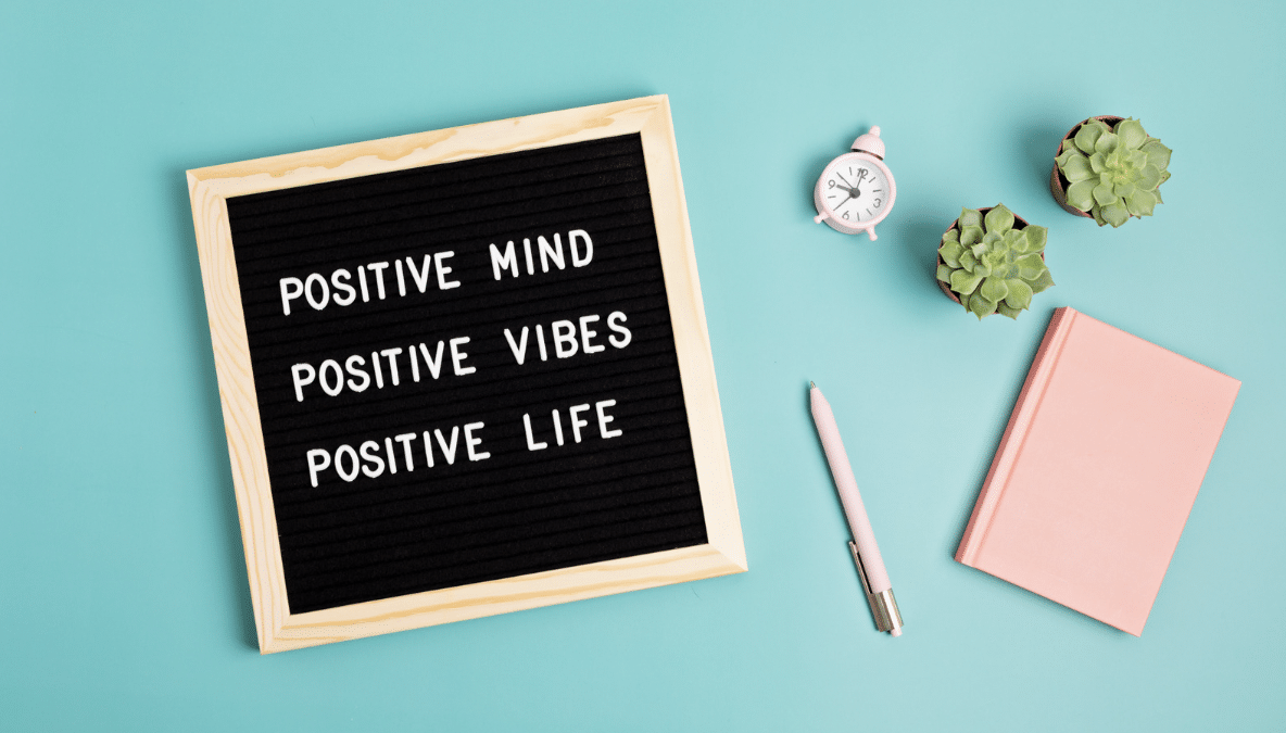 inspiration quote on letter board: positive mind, positive vibes, positive life.