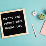 inspiration quote on letter board: positive mind, positive vibes, positive life.