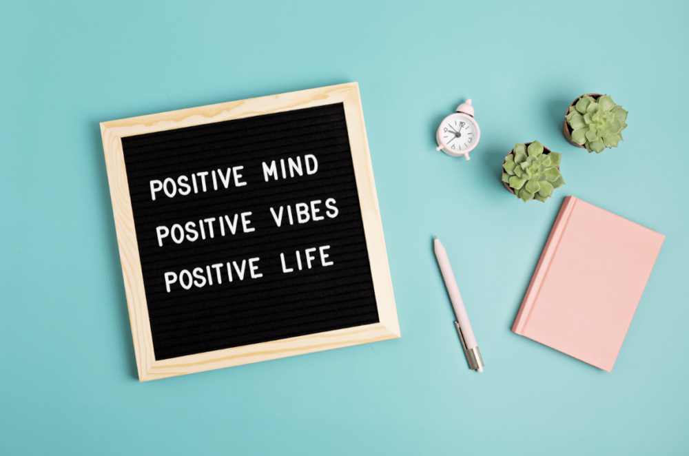 inspiration quote on letter board: positive mind, positive vibes, positive life.
