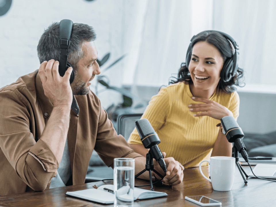 man and woman podcasting