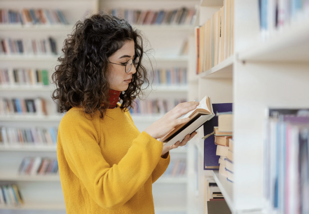 lady reading business development book