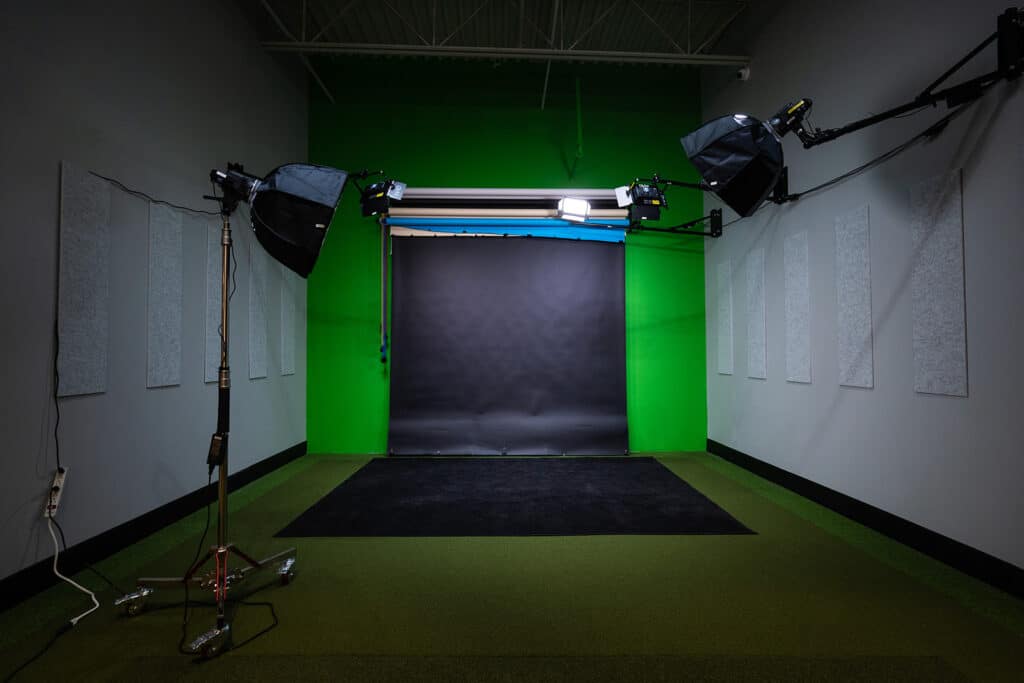 production room with lights, workspace, and backdrops; different angle
