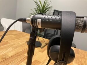 podcast microphone labeled with headset