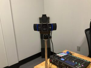 lens lifted on logi tech cameras in podcast room