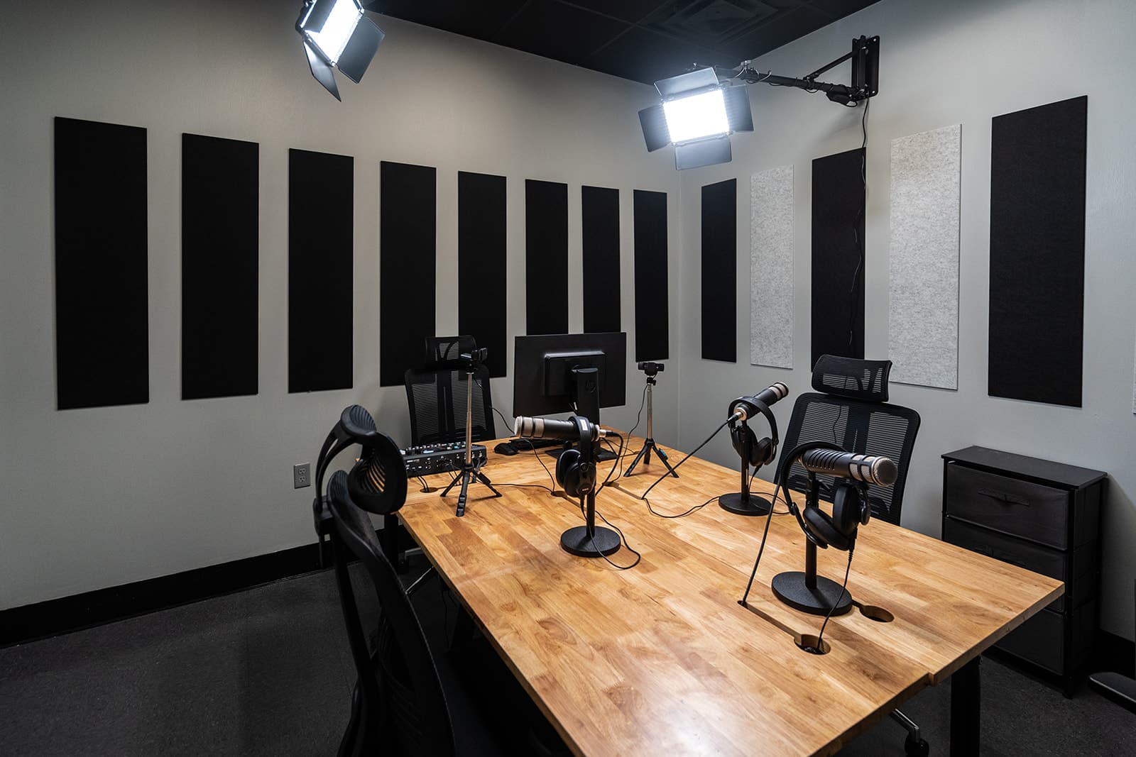 podcast room setup with soundproofing wall mountings