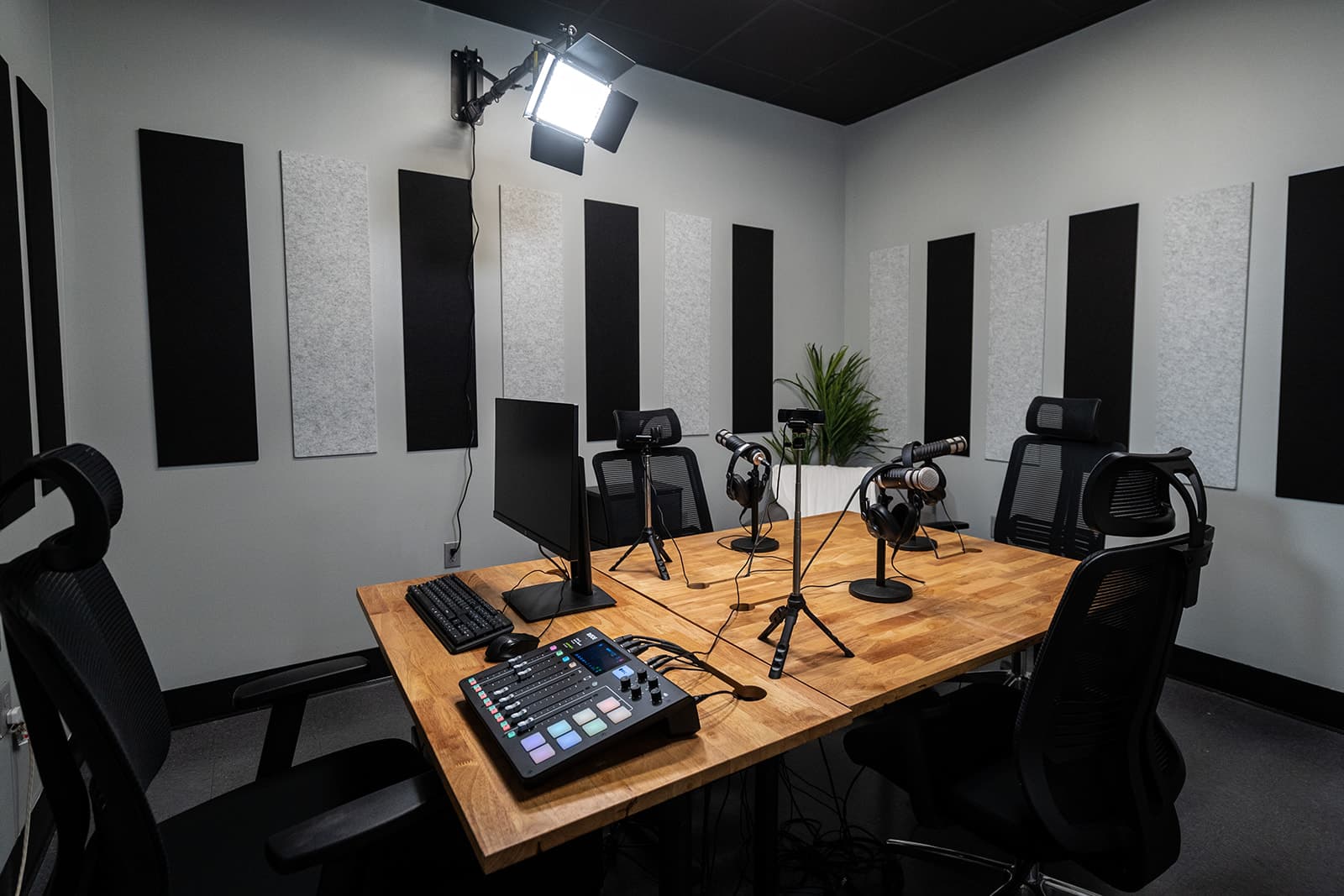podcast room setup with soundproofing wall mountings