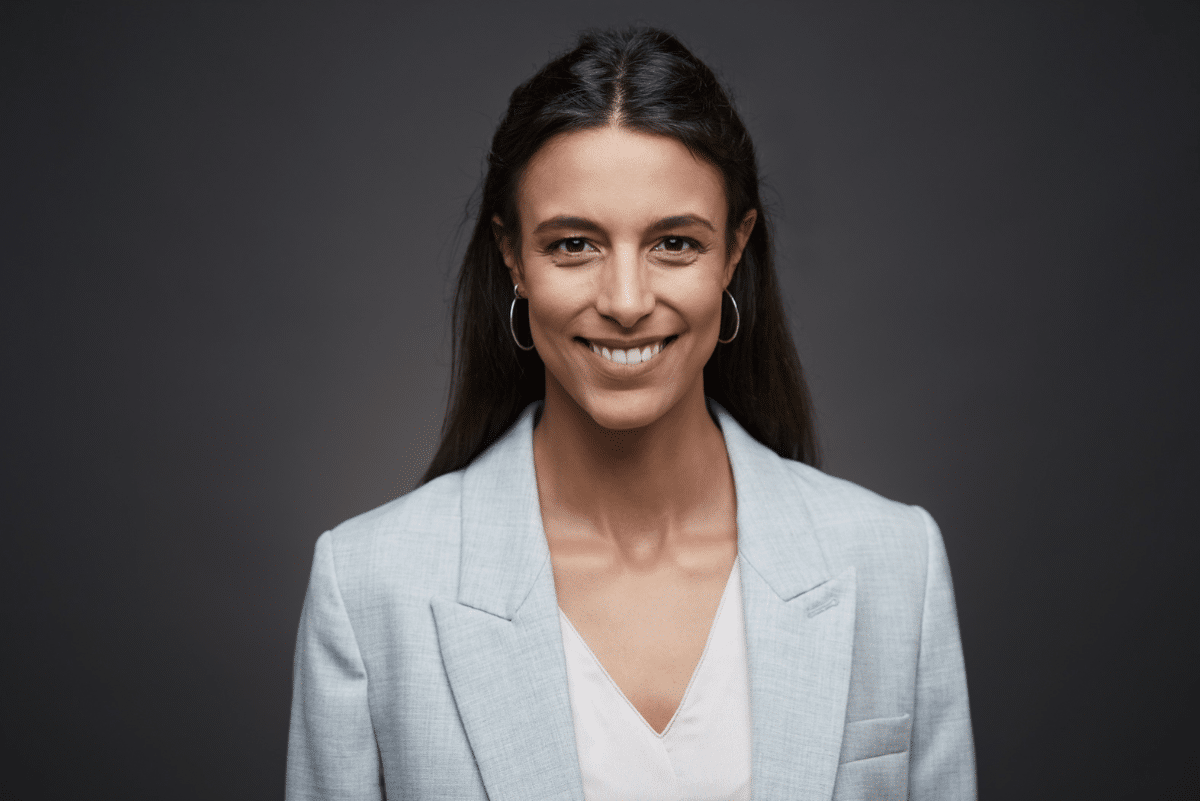 Professional woman smiling for a headshot photo.